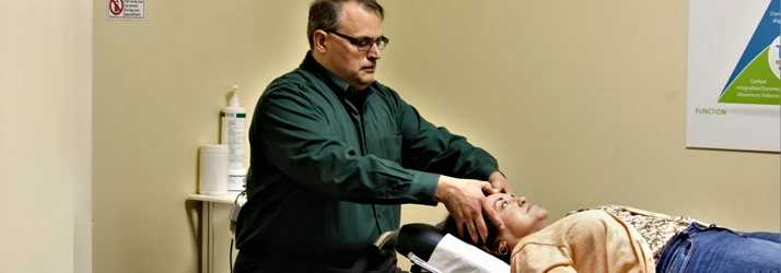 Chiropractor Redmond WA Andy Marrone With Patient