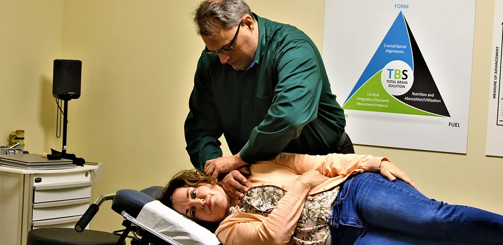 Chiropractor Redmond WA Andy Marrone With Patient