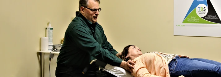 Chiropractor Redmond WA Andy Marrone With Patient