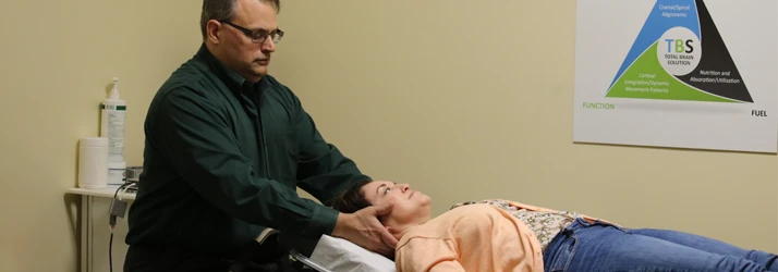 Chiropractor Redmond WA Andy Marrone With Patient